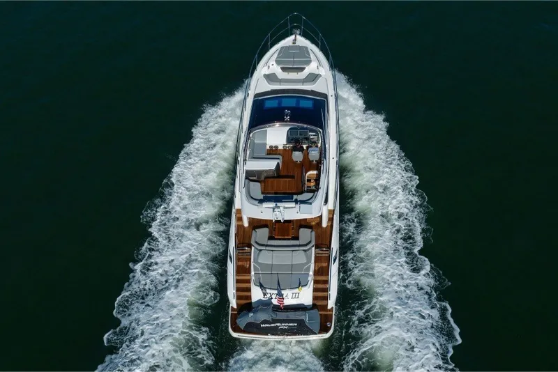 Slide: The Image of Aerial view of 2021 Princess S66 yacht cruising on open water. - 12