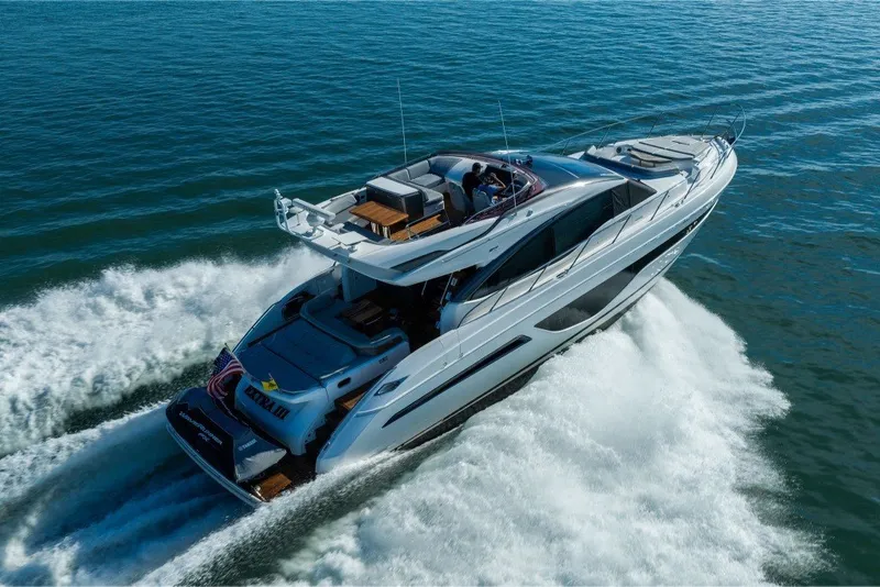 Slide: The Image of Luxurious 2021 Princess S66 yacht cruising swiftly on open water. - 10