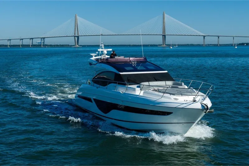 Slide: The Image of Luxury Princess S66 yacht cruising near a bridge, 2021 model. - 6