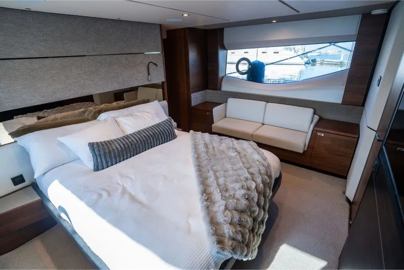 Slide: The Image of Luxurious bedroom interior of 2021 Princess S66 yacht with elegant furnishings. - 26