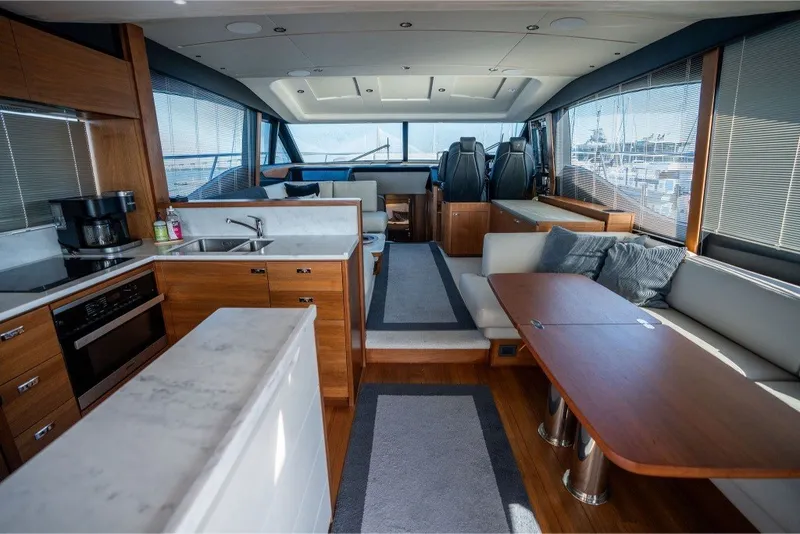 Slide: The Image of Luxurious interior of 2021 Princess S66 yacht with modern kitchen and seating area. - 19