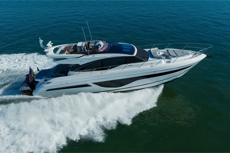 Slide: The Image of Luxury 2021 Princess S66 yacht cruising on open water. - 8