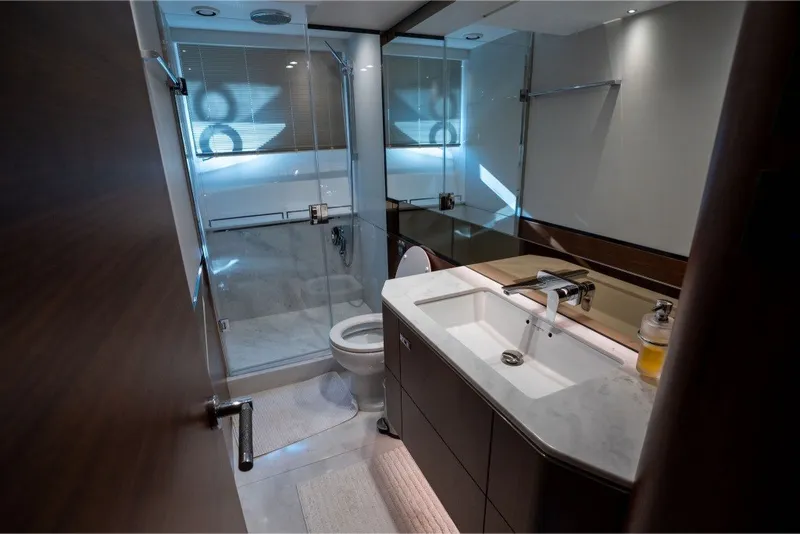 Slide: The Image of Luxurious bathroom in 2021 Princess S66 yacht with modern fixtures and elegant design. - 28
