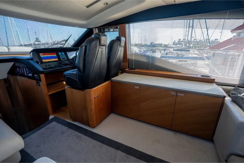 Slide: The Image of Luxurious interior of 2021 Princess S66 yacht with modern helm and seating area. - 22