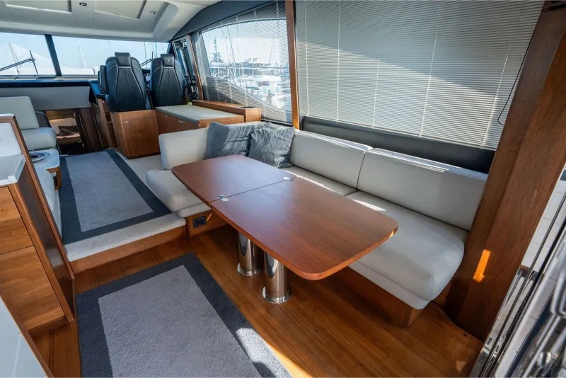 Slide: The Image of Luxurious interior of 2021 Princess S66 yacht with elegant seating and wooden table. - 20