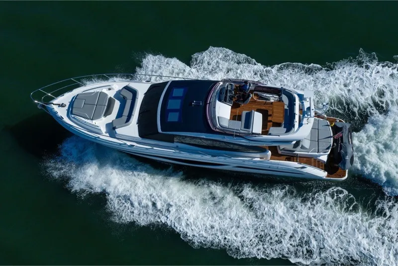 Slide: The Image of Aerial view of 2021 Princess S66 yacht cruising on open water. - 11