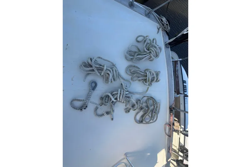 Slide: The Image of Coiled ropes on deck of 1975 Gulfstar 43 Trawler boat. - 75