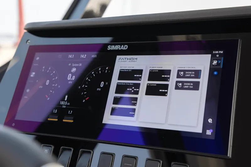 Slide: The Image of The image shows a modern Simrad display on a 2027 Cruisers Yachts 38 VTR. - 15