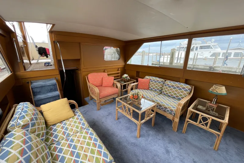Slide: The Image of Interior of 1962 Chris-Craft 55 Commander with colorful seating and nautical decor. - 25