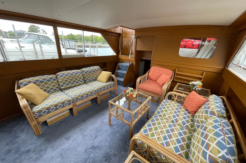Slide: The Image of Interior of 1962 Chris-Craft 55 Commander with patterned seating and floral decor. - 29