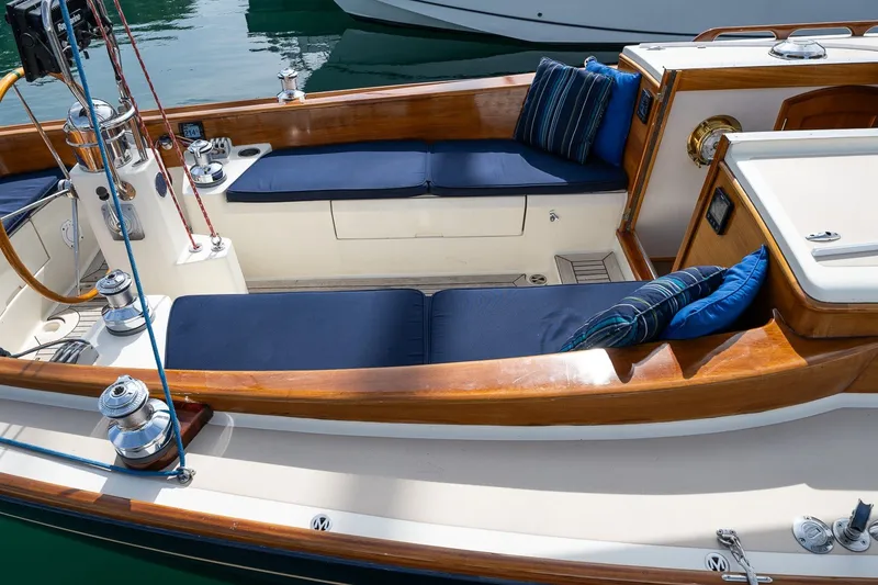 Slide: The Image of Luxurious 2009 Morris M36 yacht interior with blue cushions and polished wood finish. - 27