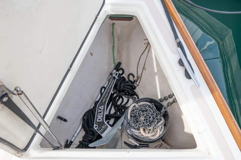 Slide: The Image of Anchor locker of 2009 Morris M36 sailboat with ropes and Delta anchor. - 18