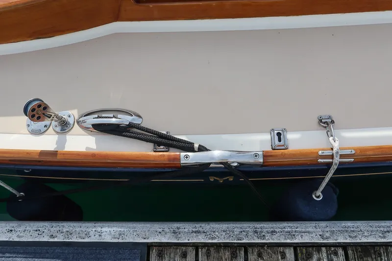 Slide: The Image of Close-up of a 2009 Morris M36 boat deck with cleats and mooring lines. - 16