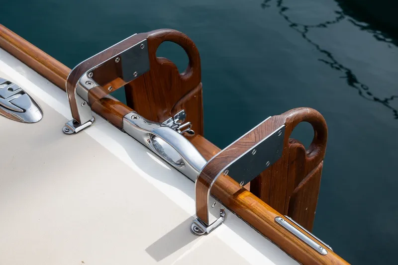 Slide: The Image of Wooden and metal boat railing detail on a 2009 Morris M36 yacht. - 23