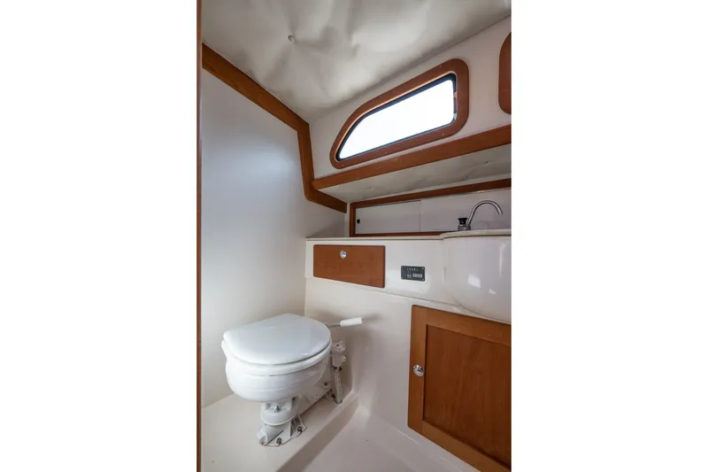 Slide: The Image of Interior of 2009 Morris M36 yacht bathroom with wooden accents and compact design. - 47
