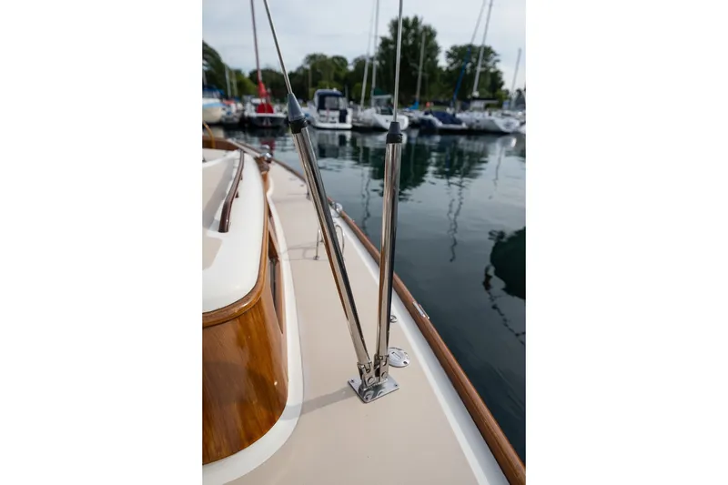 Slide: The Image of Close-up of 2009 Morris M36 yacht deck with polished metal fittings and wooden trim. - 15
