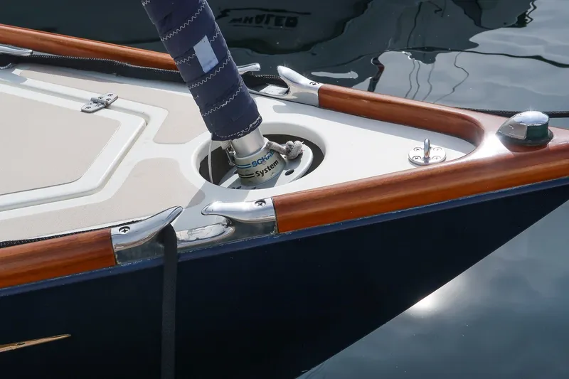 Slide: The Image of Close-up of 2009 Morris M36 sailboat deck with polished wood and metal fittings. - 17