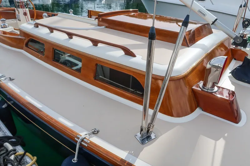 Slide: The Image of 2009 Morris M36 yacht deck with polished wood and sleek design. - 9