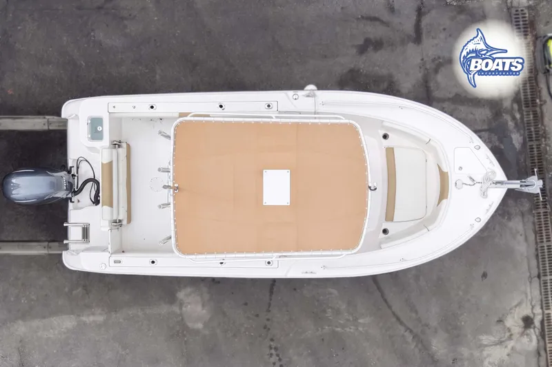 Slide: The Image of Overhead view of 2021 Edgewater 208CC boat on concrete surface. - 10