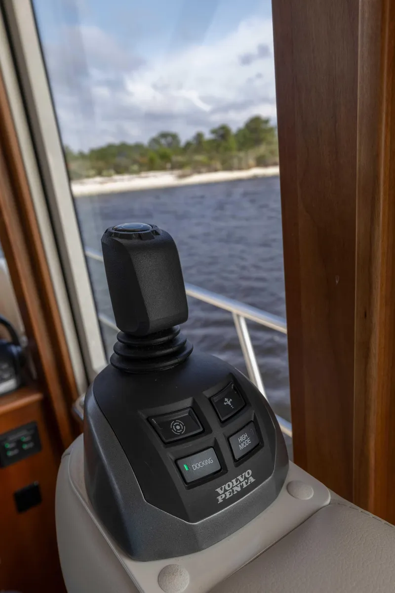 Slide: The Image of Control panel of 2026 Sabre 58 Salon Express yacht with water view. - 16