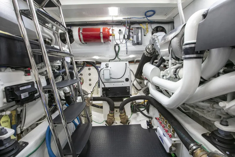 Slide: The Image of Engine room of 2026 Sabre 58 Salon Express, featuring advanced mechanical systems and equipment. - 26