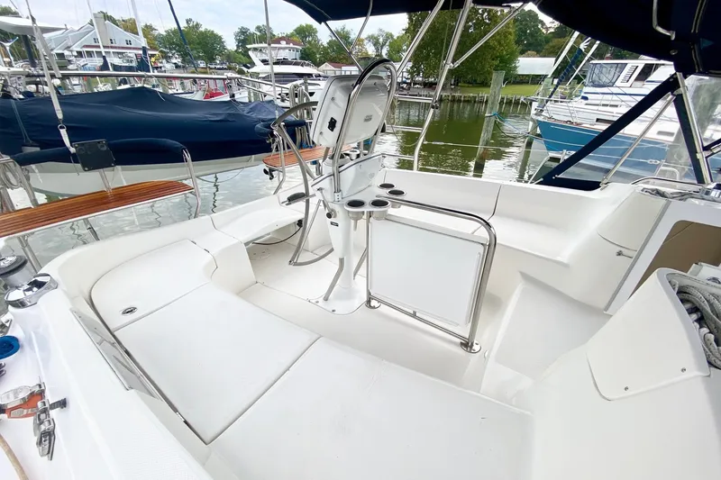 Slide: The Image of 2008 Hunter 41 Aft Cockpit sailboat interior with seating and steering wheel. - 48