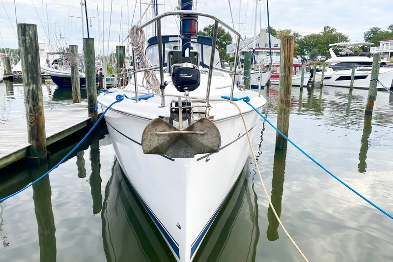 Slide: The Image of 2008 Hunter 41 Aft Cockpit sailboat docked at marina, front view. - 38