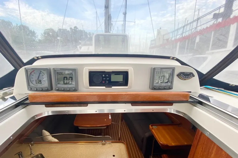 Slide: The Image of Cockpit view of 2008 Hunter 41 Aft Cockpit sailboat with navigation instruments. - 56