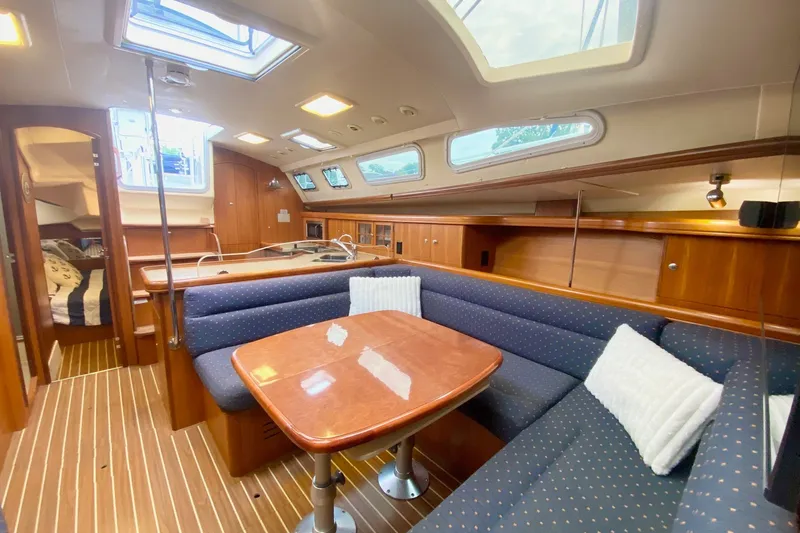 Slide: The Image of Luxurious interior of 2008 Hunter 41 Aft Cockpit yacht with elegant wood finish. - 16