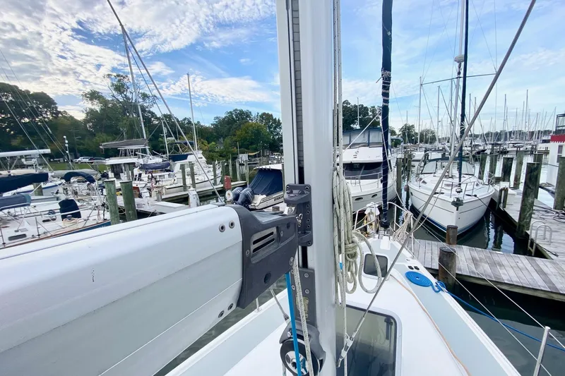 Slide: The Image of Sailboats docked at a marina, featuring a 2008 Hunter 41 Aft Cockpit. - 44