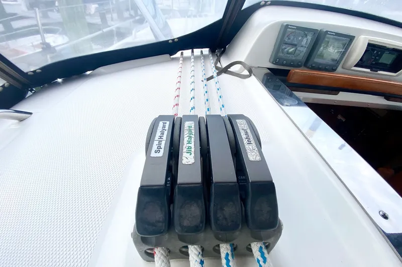 Slide: The Image of Control panel and ropes on a 2008 Hunter 41 Aft Cockpit sailboat. - 57