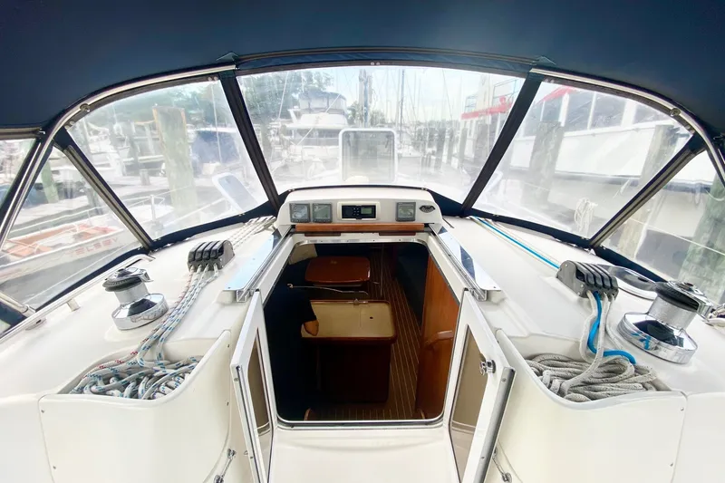 Slide: The Image of 2008 Hunter 41 Aft Cockpit sailboat interior with navigation equipment and ropes. - 55