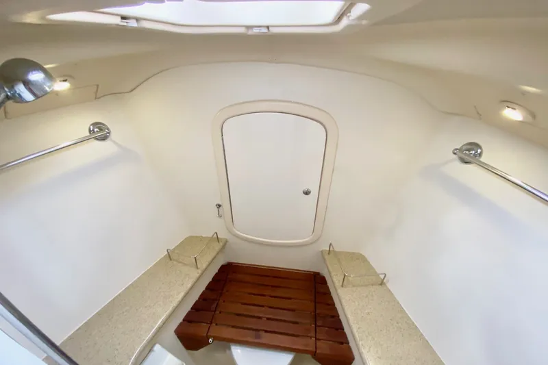 Slide: The Image of Interior of 2008 Hunter 41 Aft Cockpit yacht bathroom with wooden seat and modern fixtures. - 31