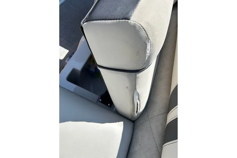 Slide: The Image of 2019 Crest Classic 230 SLC boat seat with visible wear and tear. - 6