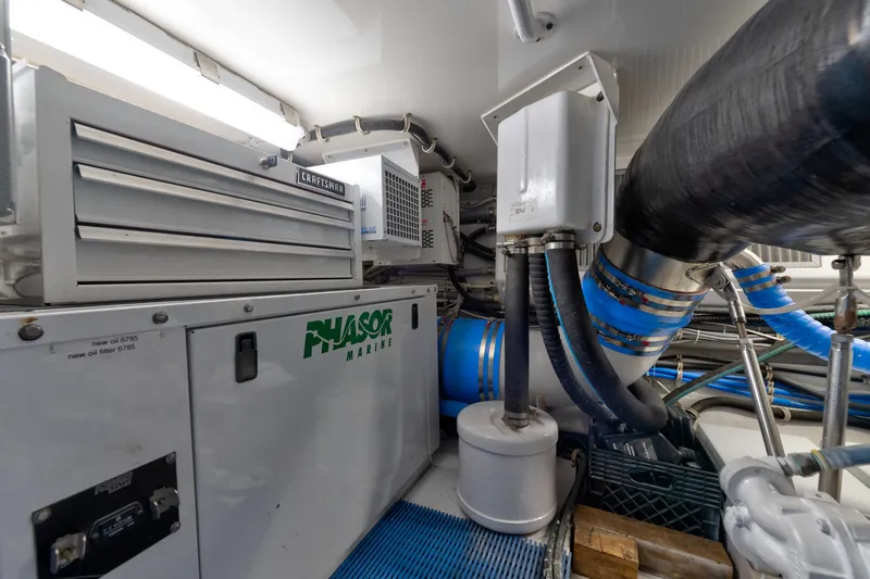 Slide: The Image of Engine room of 2005 Hatteras 60 Convertible yacht with Phasor Marine generator. - 46