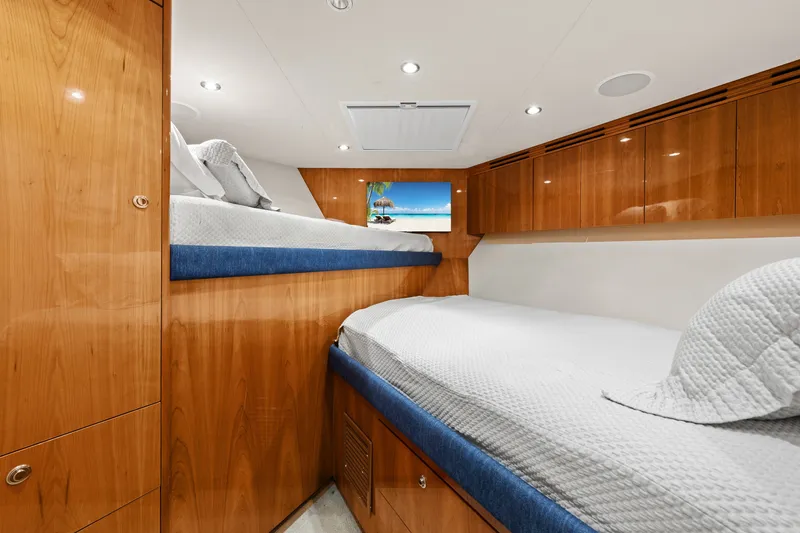 Slide: The Image of Luxurious cabin interior of 2005 Hatteras 60 Convertible yacht with wooden finishes. - 22