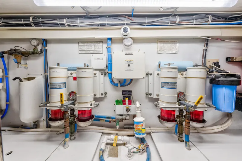 Slide: The Image of Engine room of 2005 Hatteras 60 Convertible yacht with fuel filtration system. - 50