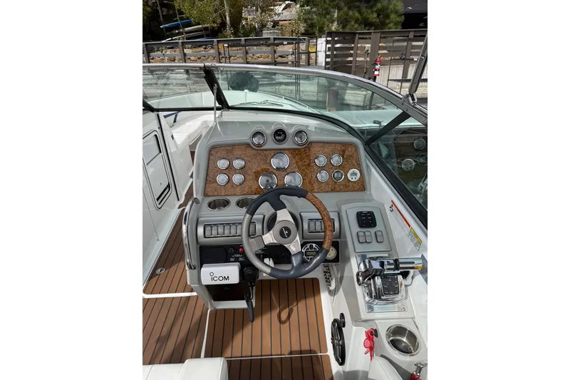 Slide: The Image of 2008 Formula 310 Bowrider dashboard with steering wheel and control panel. - 8