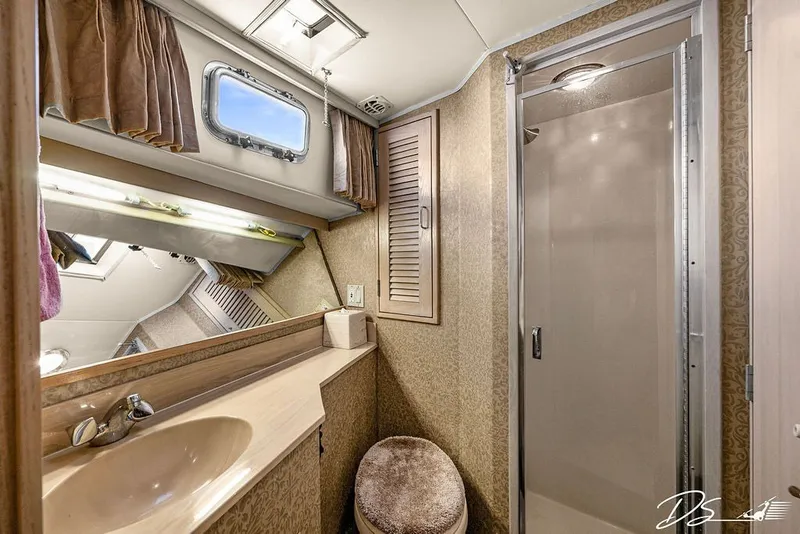 Slide: The Image of Bathroom interior of 1993 Tollycraft 57 Pilothouse Motor Yacht with shower and sink. - 17