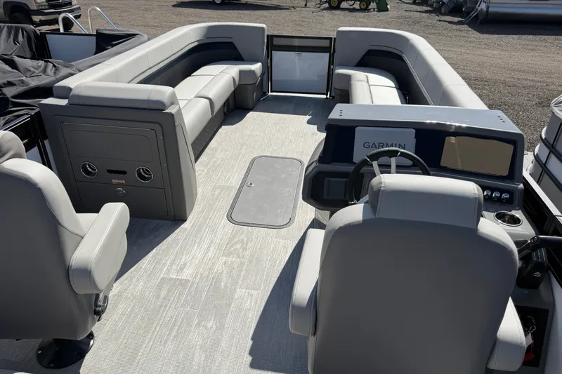 Slide: The Image of Luxurious 2027 Whisper Vision Splash Pad boat interior with plush seating and modern dashboard. - 17