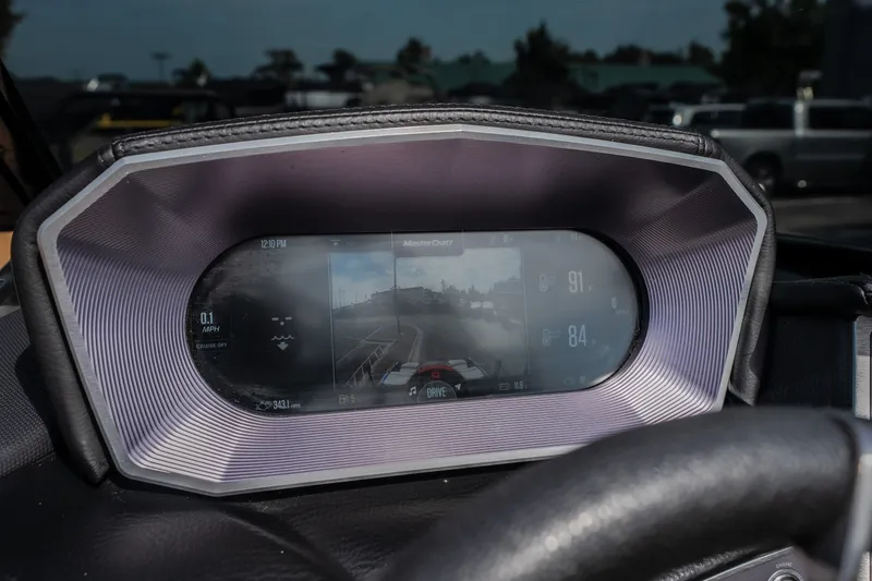 Slide: The Image of Dashboard display of a 2021 MasterCraft X24 boat showing speed and navigation details. - 23