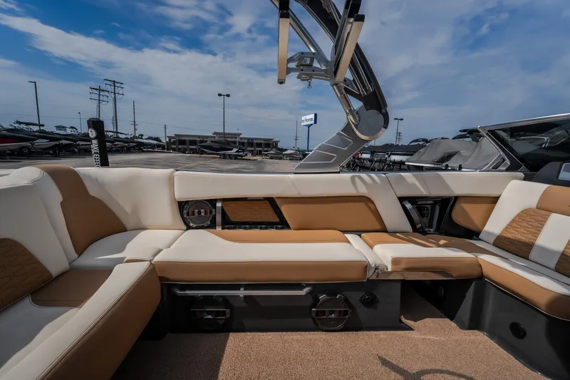 Slide: The Image of 2021 MasterCraft X24 boat interior with luxurious seating and modern design. - 49