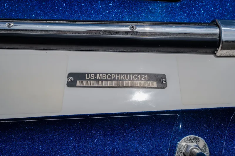 Slide: The Image of 2021 MasterCraft X24 boat identification plate with serial number and barcode. - 8