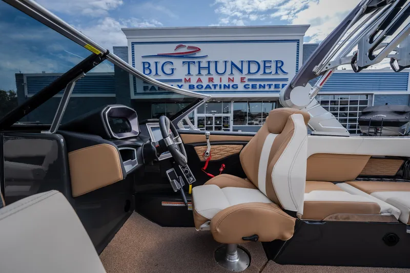 Slide: The Image of 2021 MasterCraft X24 boat interior at Big Thunder Marine dealership. - 32