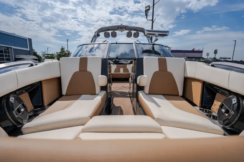 Slide: The Image of Luxurious interior of a 2021 MasterCraft X24 boat with plush seating and modern design. - 5