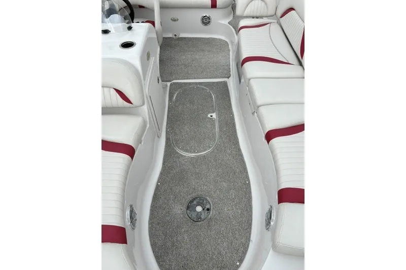 Slide: The Image of Interior of 2012 Starcraft 2000 IO Limited boat with white and red seating. - 31
