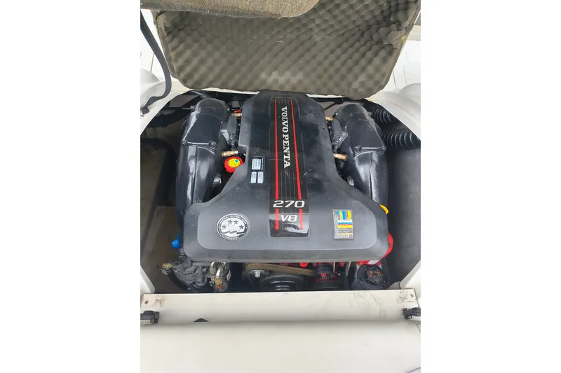 Slide: The Image of Volvo Penta V8 engine in a 2012 Starcraft 2000 IO Limited boat. - 43