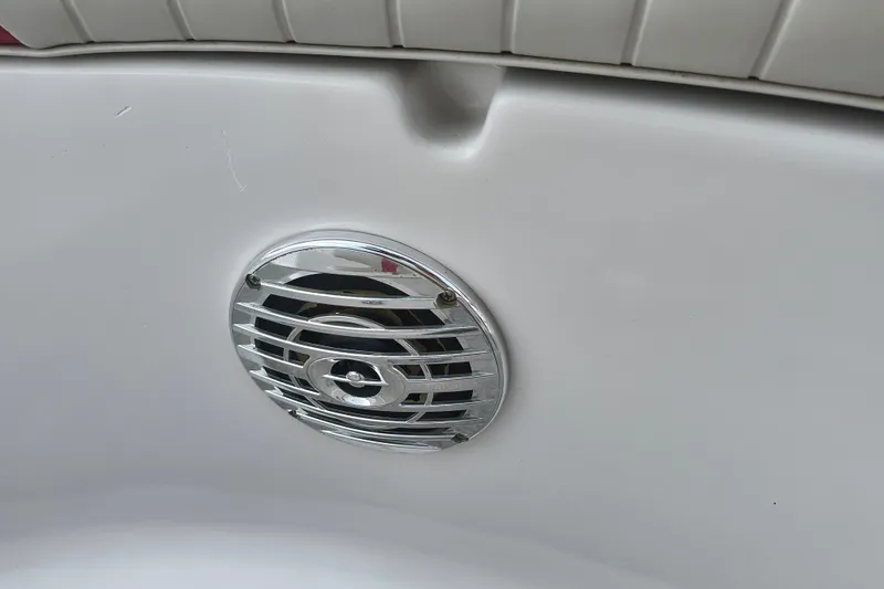 Slide: The Image of Chrome speaker grille on 2012 Starcraft 2000 IO Limited boat interior. - 41