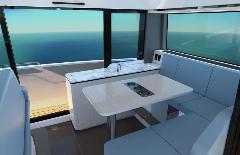 Slide: The Image of Interior of a modern yacht with blue seating and a table, surrounded by large windows overlooking the sea. - 16