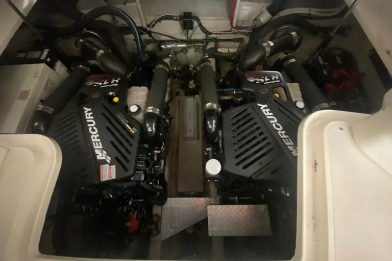 Slide: The Image of Engine room of a 2006 Sea Ray 38 Sundancer with twin Mercury engines. - 43